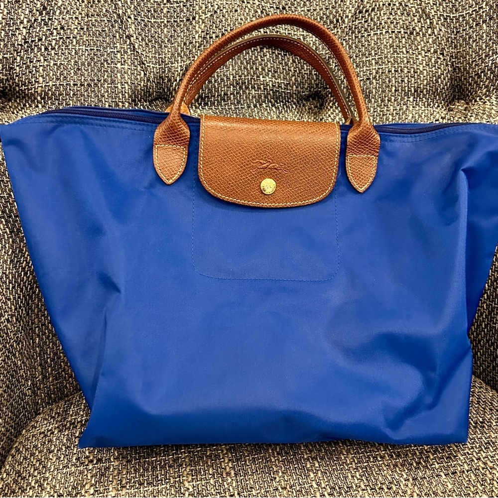 Small blue short handle Longchamp bag- royal blue